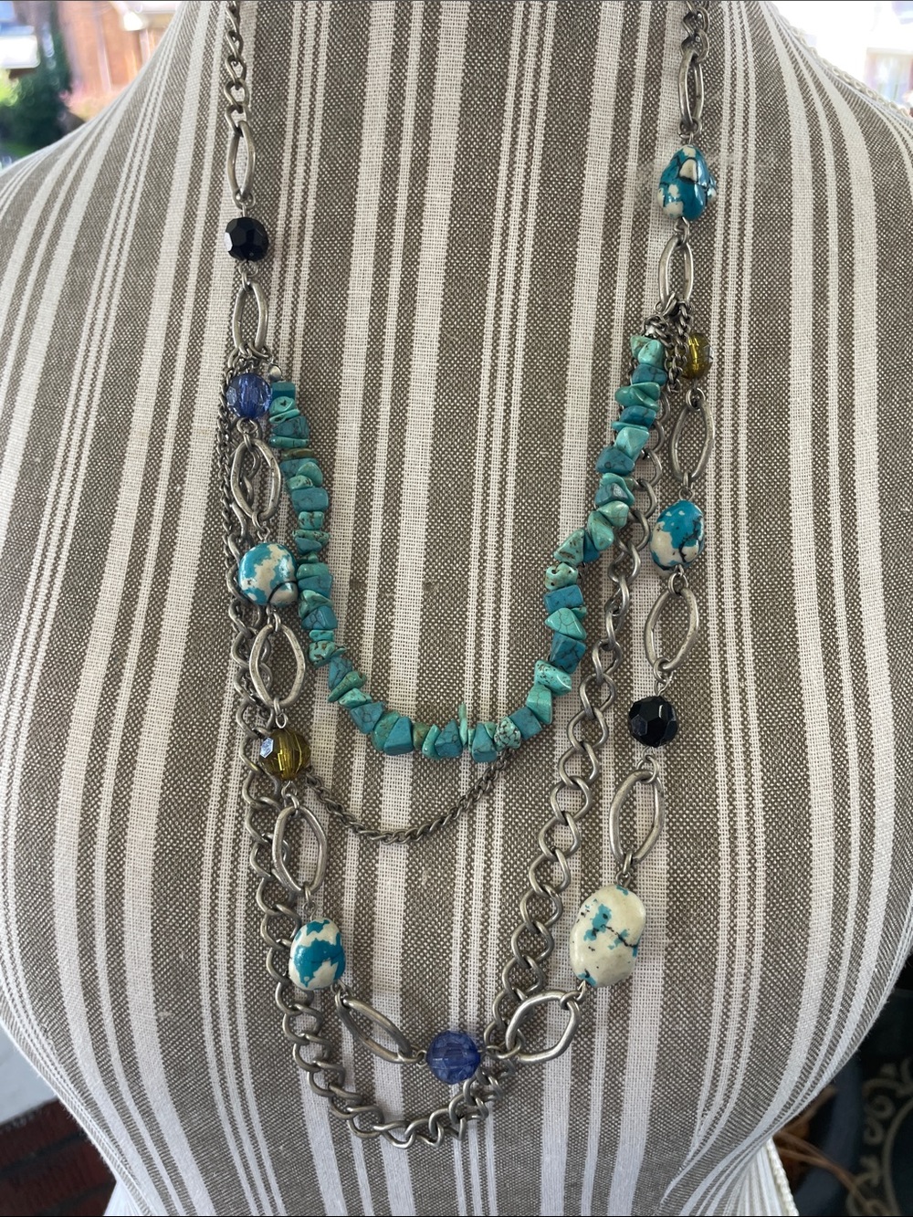 Boho layered necklace with turquoise stones and pottery beads. Purchased in NM.
